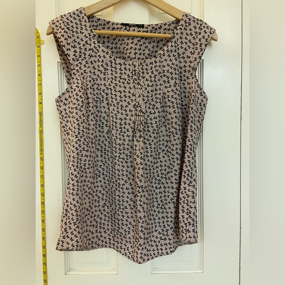 Cute Oasis short sleeve top in light pink with black butterfly print.